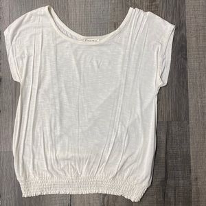 White scoop neck tee with scrunched bottom